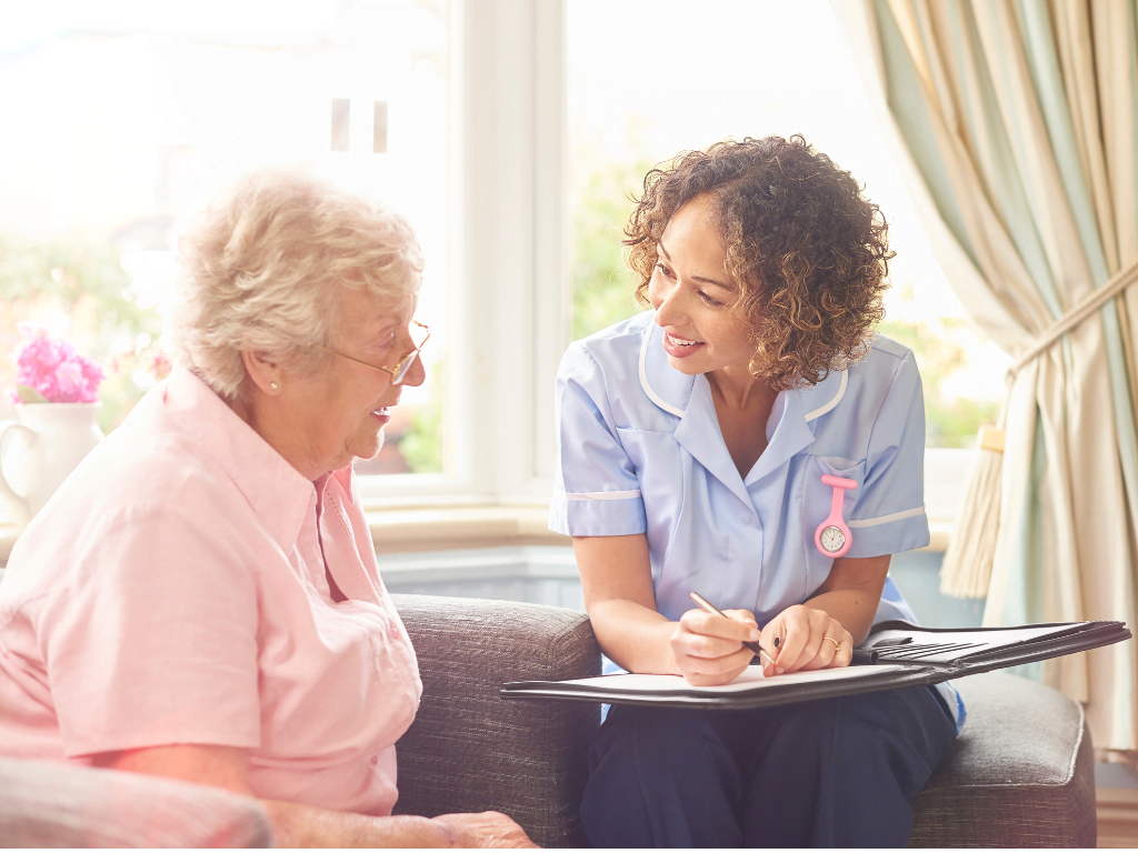 caregiver-speaking-with-elderly (1) Choosing In Home Care Services