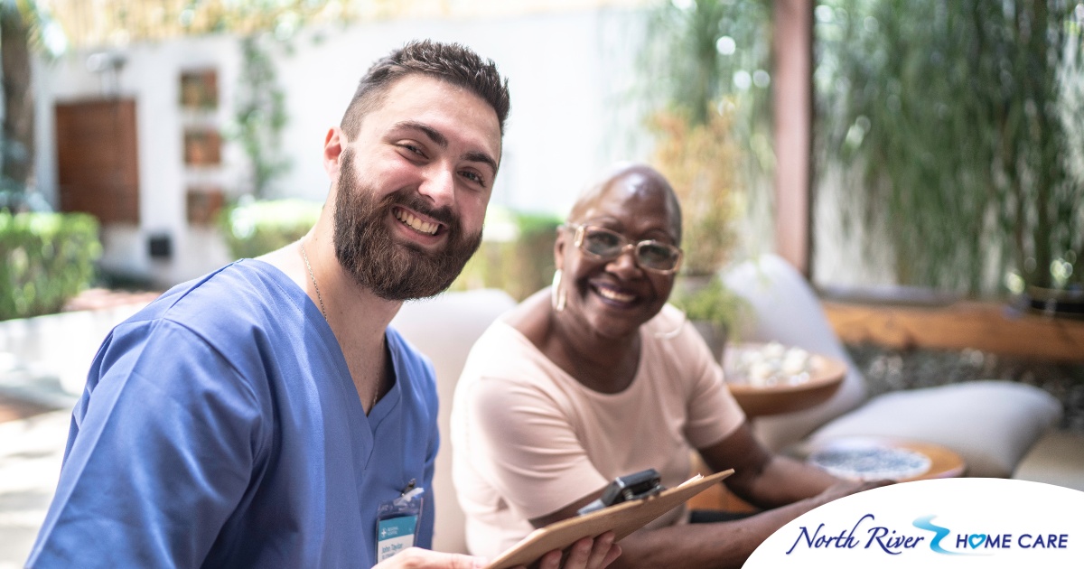 A caregiver and client smile showing that a career as a caregiver can be rewarding.