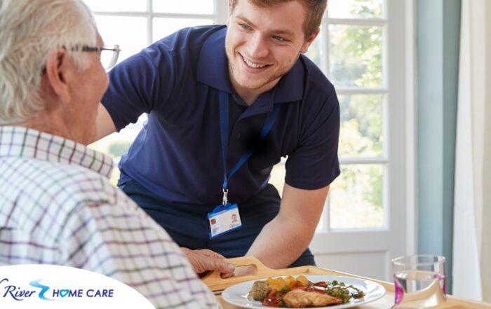 Professional caregiving involves helping clients with iADLs and ADLs as demonstrated by this caregiver helping a client by bringing a meal.